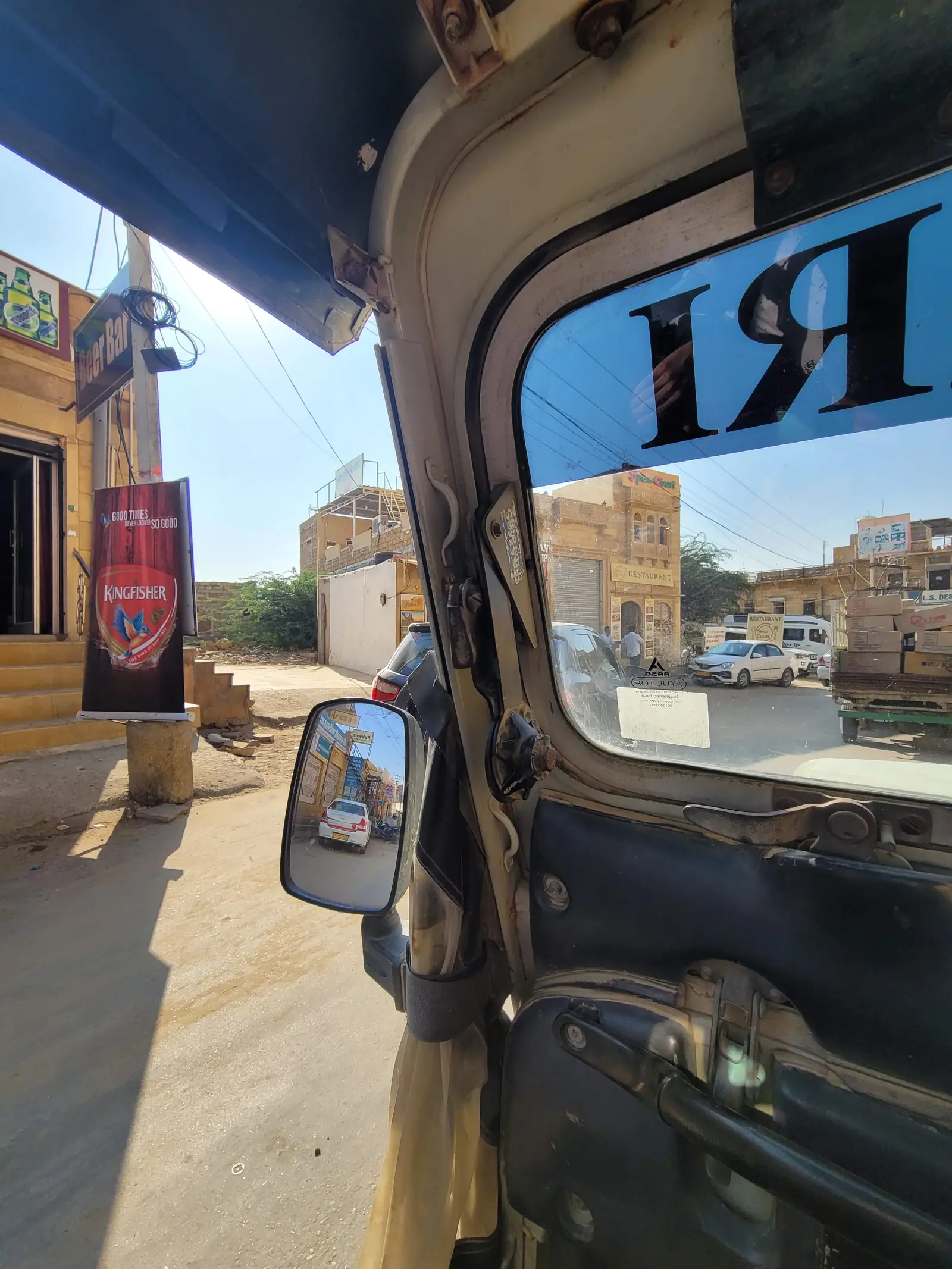 Jaisalmer through the open window of the jeep on the way out of town