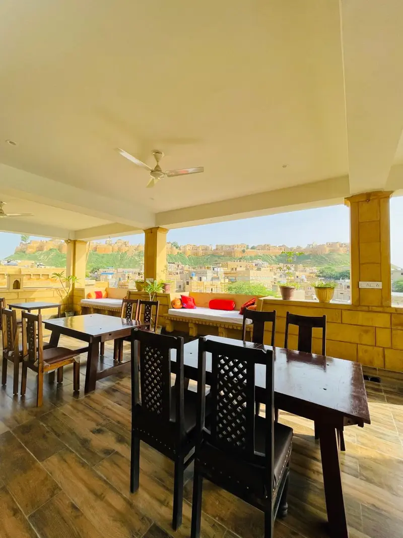 The rooftop restaurant, tables laid, the fort straight ahead