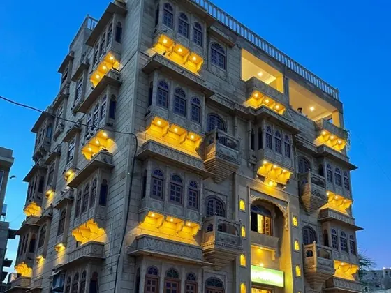 The Wonbin Safari hotel on Fort Road, lit up at dusk